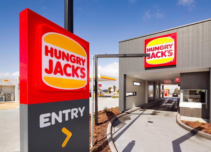 <u>Query</u>: Black car leaving a fast food restaurant after picking up order<br>
      <u>Named Entity</u>: Hungry Jacks