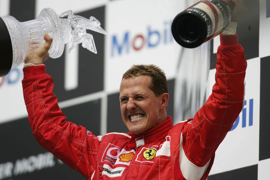 <u>Query</u>: German born race driver celebrating after winning a Championship title<br>
      <u>Named Entity</u>: Michael Schumacher